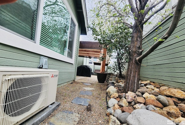 3348 Current Ct, Reno, NV 89509 - view of property exterior featuring a cooling unit and a patio area