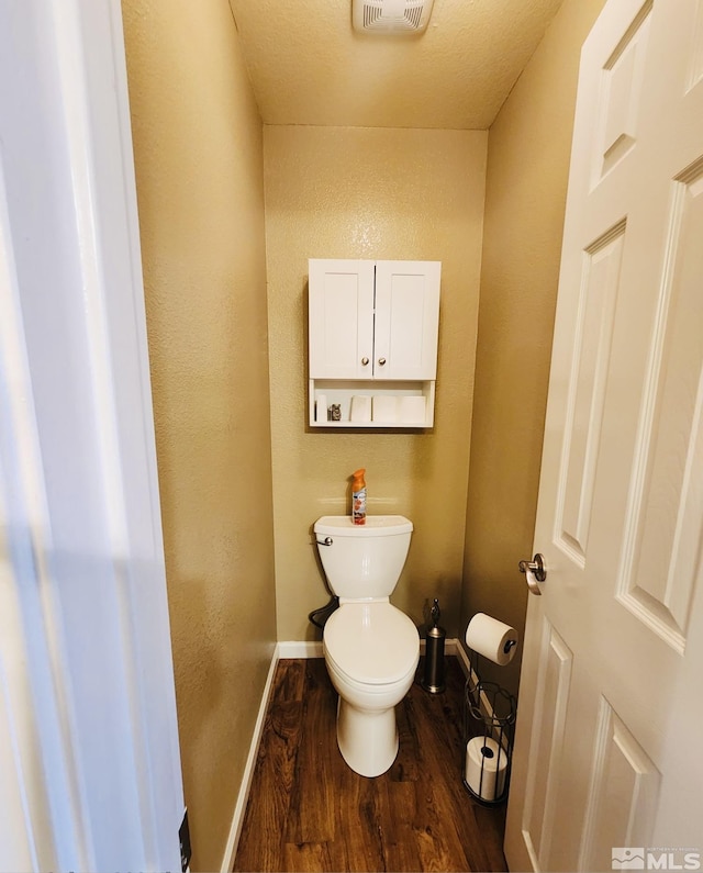 3348 Current Ct, Reno, NV 89509 - bathroom featuring wood finished floors, toilet, and baseboards