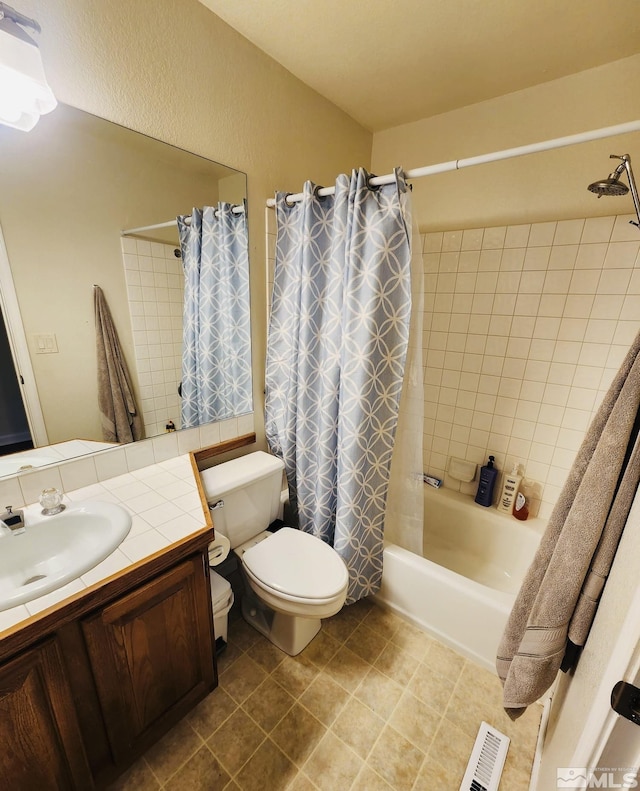 3348 Current Ct, Reno, NV 89509 - full bathroom featuring toilet, shower / bathtub combination with curtain, vanity, and tile patterned flooring
