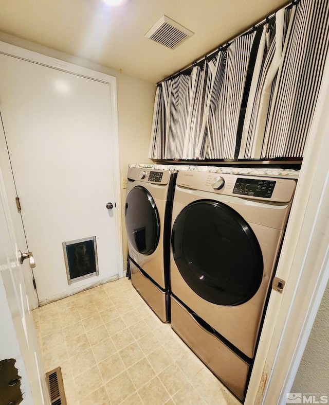 3348 Current Ct, Reno, NV 89509 - laundry room featuring washing machine and dryer