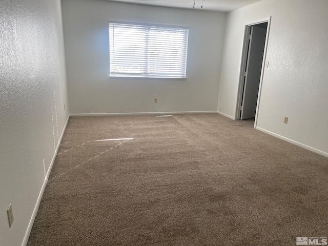 1145 Virbel Ln, Reno, NV 89502 - carpeted empty room with baseboards