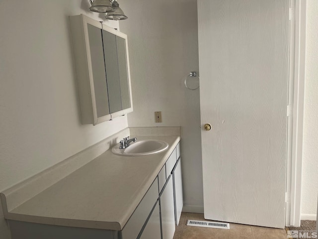 1145 Virbel Ln, Reno, NV 89502 - bathroom with tile patterned floors and vanity