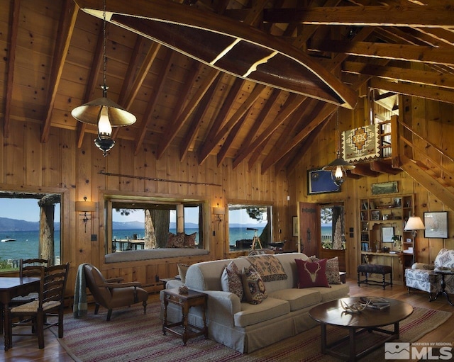 200 Overlook Dr Unit 29, Carson City, NV 89705 - living area featuring wood walls, high vaulted ceiling, wood finished floors, a water view, and wooden ceiling with exposed beams