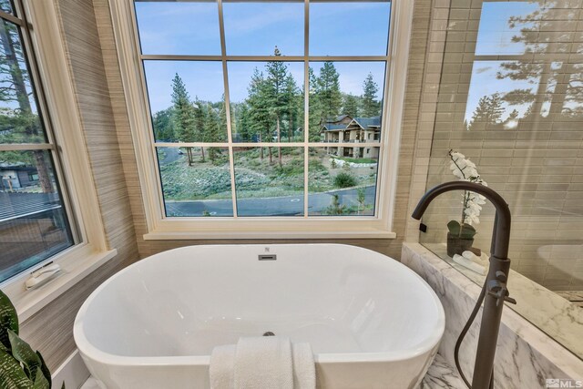 265 Mill Race Loop, Carson City, NV 89705 - full bathroom with a soaking tub and tile walls