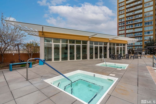 255 N Sierra St Unit 2013, Reno, NV 89501 - view of swimming pool with a hot tub, a patio area, and fence