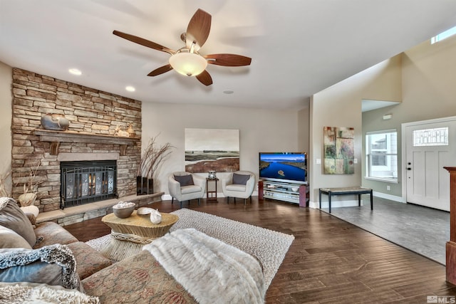 1008 Keystone Ct, Gardnerville, NV 89460 - living room featuring a stone fireplace, a ceiling fan, and wood finished floors