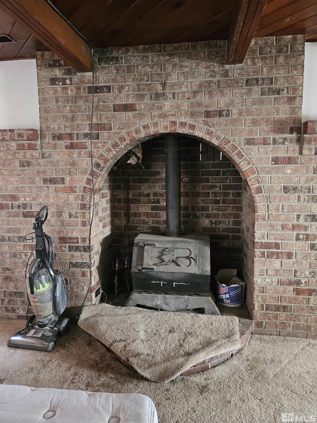 116 English St, Hawthorne, NV 89415 - detailed view of a wood stove and carpet flooring