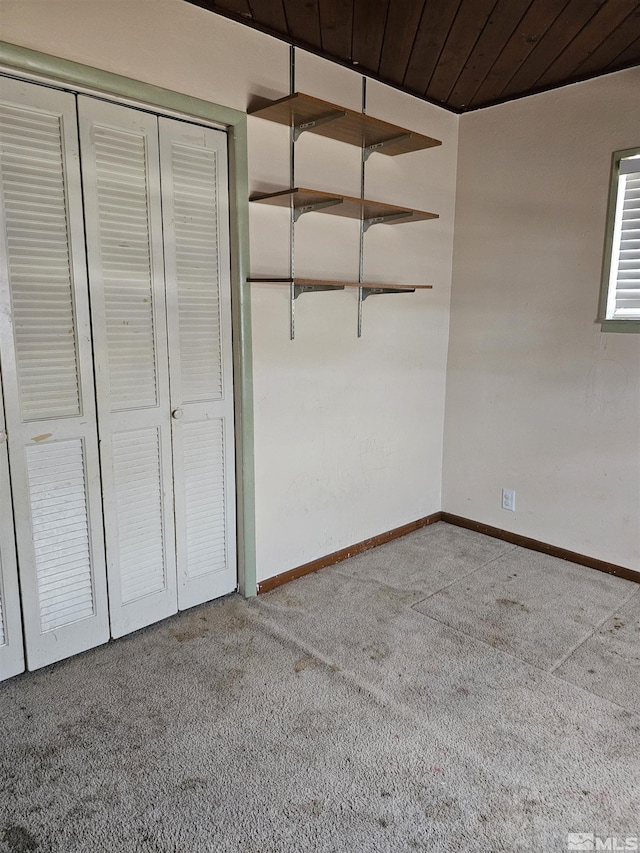 116 English St, Hawthorne, NV 89415 - garage featuring baseboards and wooden ceiling
