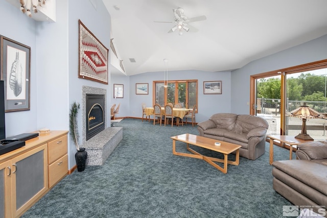 4223 Rancheria Rd, Fallon, NV 89406 - living area featuring carpet, lofted ceiling, a warm lit fireplace, a ceiling fan, and baseboards