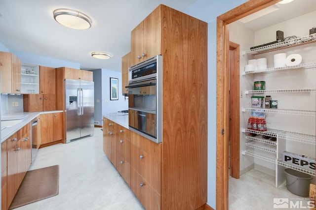 4223 Rancheria Rd, Fallon, NV 89406 - kitchen with appliances with stainless steel finishes, open shelves, modern cabinets, light countertops, and light flooring