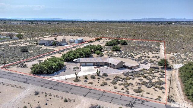 4223 Rancheria Rd, Fallon, NV 89406 - view of rural area with property parcel outlined, a desert landscape, and a mountainous background