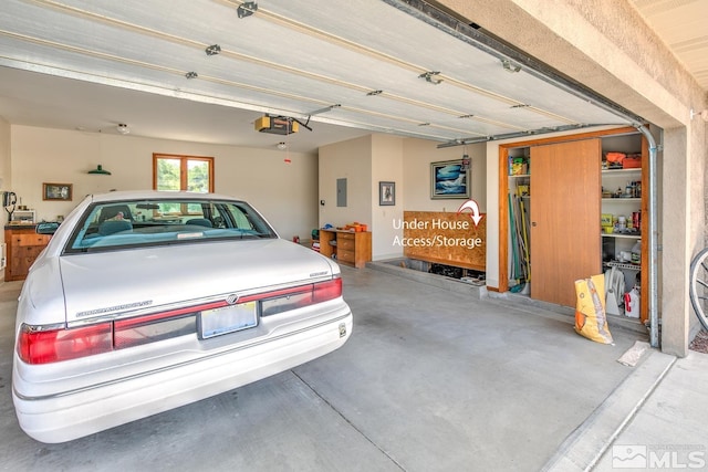 4223 Rancheria Rd, Fallon, NV 89406 - garage featuring a garage door opener and electric panel