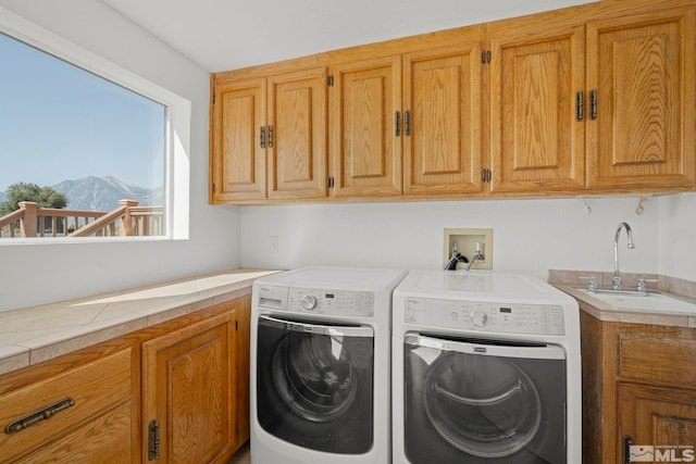 1663 Mackland Dr, Minden, NV 89423 - washroom featuring cabinet space, washer and clothes dryer, and a mountain view