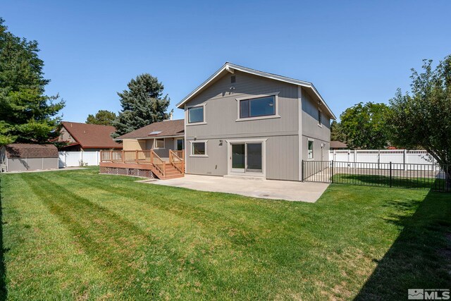 1663 Mackland Dr, Minden, NV 89423 - back of house with a patio area, a shed, an outdoor structure, and a deck