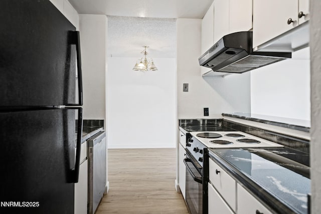 1000 Beck St Unit 276, Reno, NV 89509 - kitchen with freestanding refrigerator, white electric range oven, range hood, white cabinetry, and a chandelier