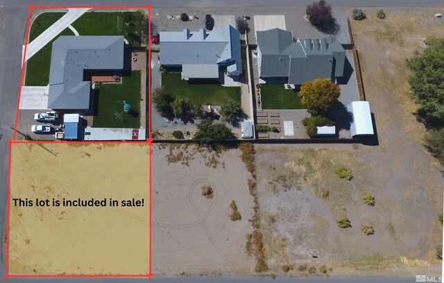 310 N Mountain View St, Yerington, NV 89447 - aerial perspective of suburban area featuring property parcel outlined