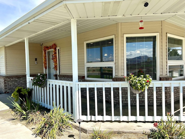 310 N Mountain View St, Yerington, NV 89447 - doorway to property with a porch and brick siding