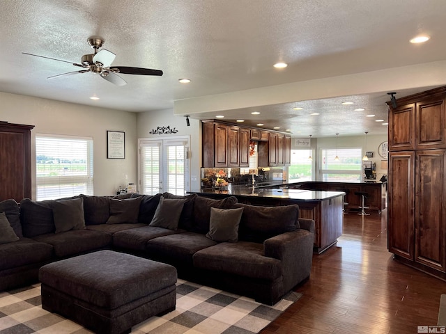 310 N Mountain View St, Yerington, NV 89447 - living room with recessed lighting, dark wood finished floors, a textured ceiling, and a ceiling fan