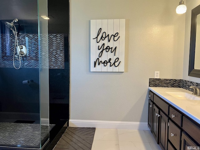 310 N Mountain View St, Yerington, NV 89447 - bathroom with marble finish flooring, tiled shower, vanity, and baseboards