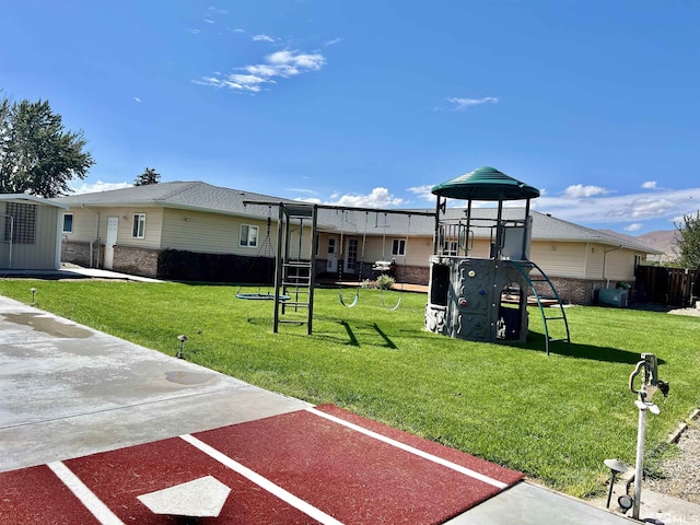 310 N Mountain View St, Yerington, NV 89447 - view of playground featuring a lawn