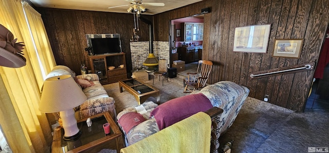 316 Toiyabe Rd, Kingston, NV 89310 - living area featuring wooden walls, carpet flooring, and ceiling fan