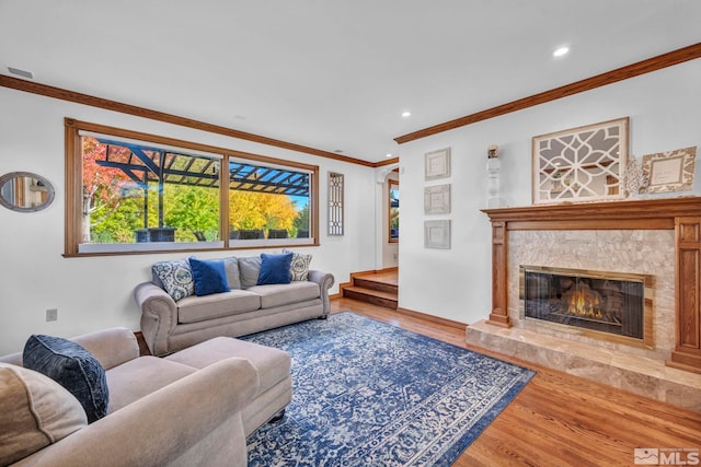 1865 Olive Ln, Reno, NV 89511 - living area with wood finished floors, crown molding, recessed lighting, a fireplace, and baseboards