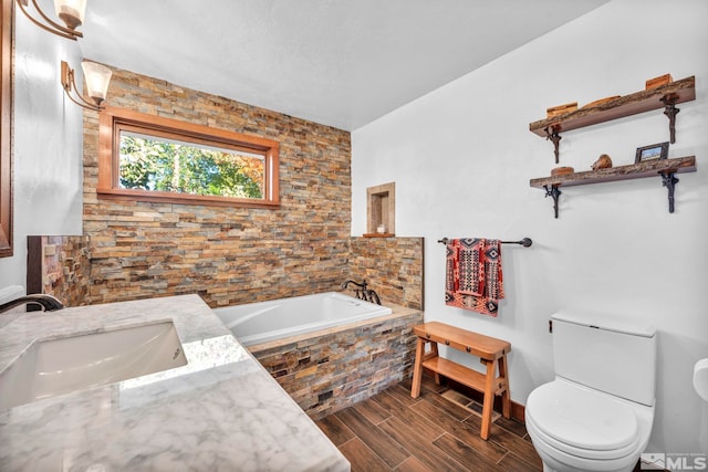 1865 Olive Ln, Reno, NV 89511 - bathroom featuring a sink, toilet, a garden tub, and wood finished floors