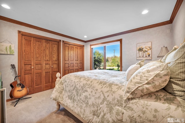 1865 Olive Ln, Reno, NV 89511 - bedroom with carpet, two closets, ornamental molding, recessed lighting, and access to exterior