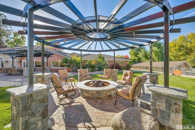 1865 Olive Ln, Reno, NV 89511 - view of patio / terrace with an outdoor fire pit and a pergola
