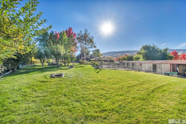 1865 Olive Ln, Reno, NV 89511 - view of yard featuring an exterior structure and a mountain view
