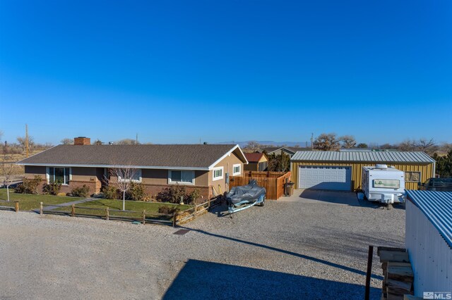 3205 Saint Clair Rd, Fallon, NV 89406 - ranch-style home featuring fence, a chimney, and an outbuilding