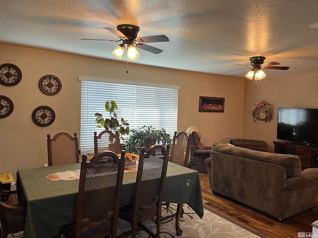 3205 Saint Clair Rd, Fallon, NV 89406 - dining room featuring ceiling fan, wood finished floors, and a textured ceiling