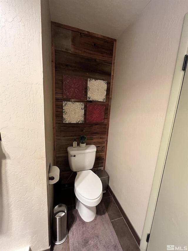 3205 Saint Clair Rd, Fallon, NV 89406 - bathroom featuring toilet, tile patterned flooring, and baseboards