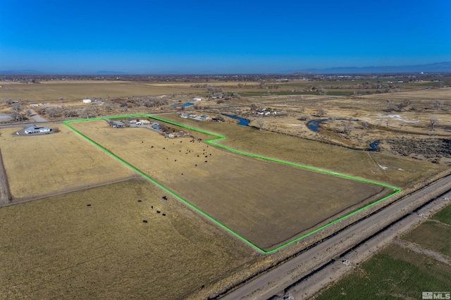 3205 Saint Clair Rd, Fallon, NV 89406 - aerial view of sparsely populated area with property parcel outlined and a mountain backdrop