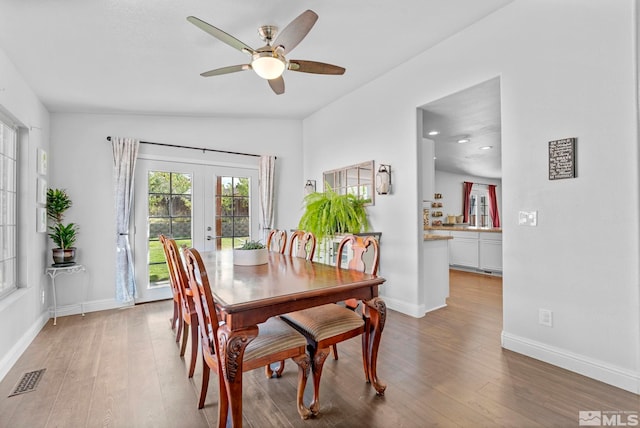17850 Brushland Dr, Reno, NV 89508 - dining space featuring french doors, light wood-style flooring, a ceiling fan, and baseboards