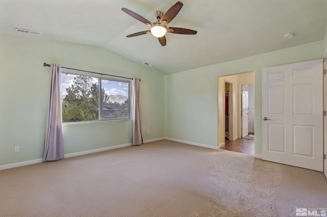 17850 Brushland Dr, Reno, NV 89508 - carpeted spare room with ceiling fan, a smoke detector, vaulted ceiling, and baseboards