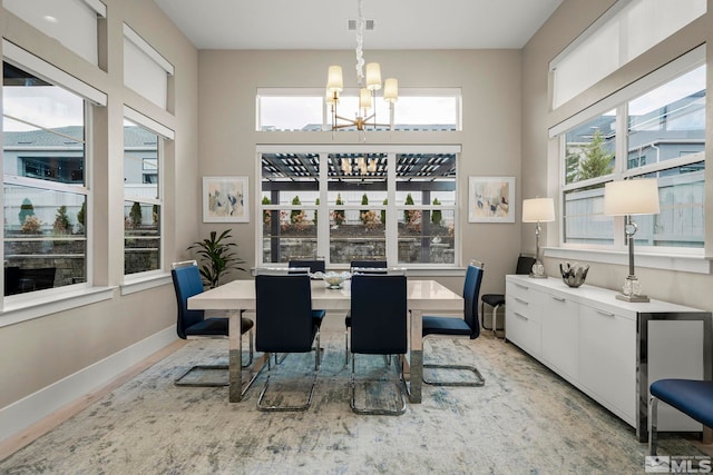 718 W Pleasant Oak Trl, Reno, NV 89511 - dining room with a chandelier and baseboards