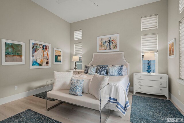 718 W Pleasant Oak Trl, Reno, NV 89511 - bedroom with wood finished floors and baseboards