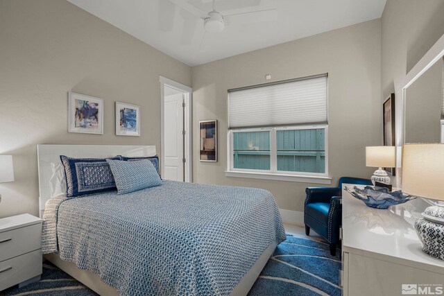 718 W Pleasant Oak Trl, Reno, NV 89511 - bedroom featuring a ceiling fan and wood finished floors