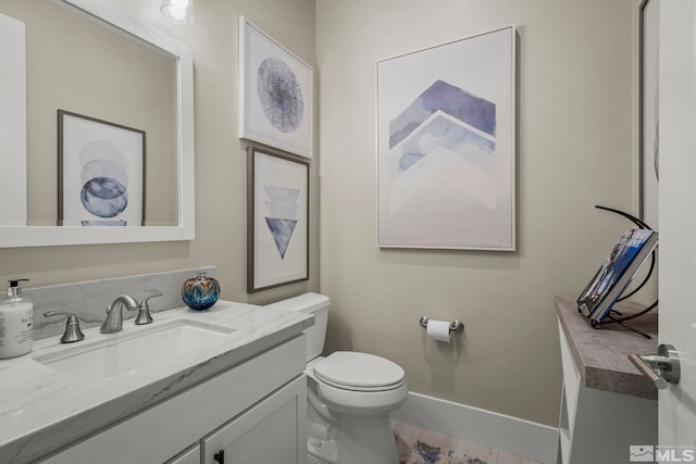 718 W Pleasant Oak Trl, Reno, NV 89511 - bathroom featuring toilet, vanity, and baseboards