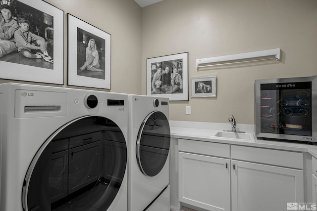 718 W Pleasant Oak Trl, Reno, NV 89511 - clothes washing area with separate washer and dryer, cabinet space, and beverage cooler