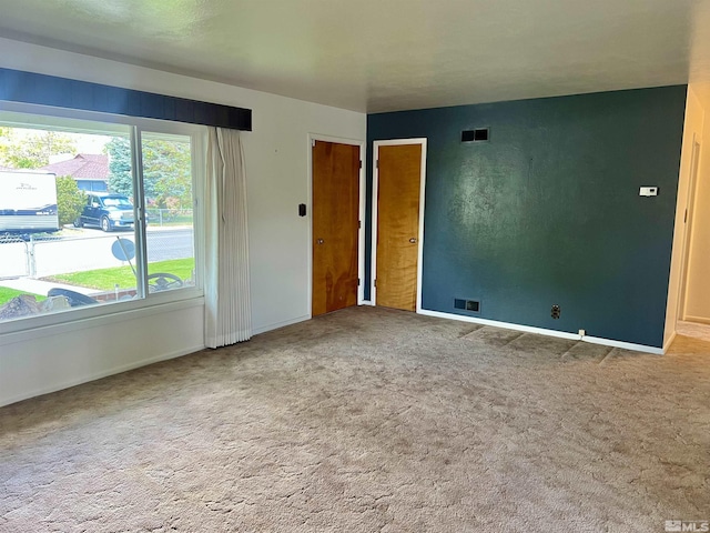 2 N Whitacre St, Yerington, NV 89447 - carpeted spare room featuring plenty of natural light and baseboards
