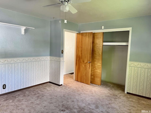 2 N Whitacre St, Yerington, NV 89447 - unfurnished bedroom with carpet flooring, a closet, and a ceiling fan