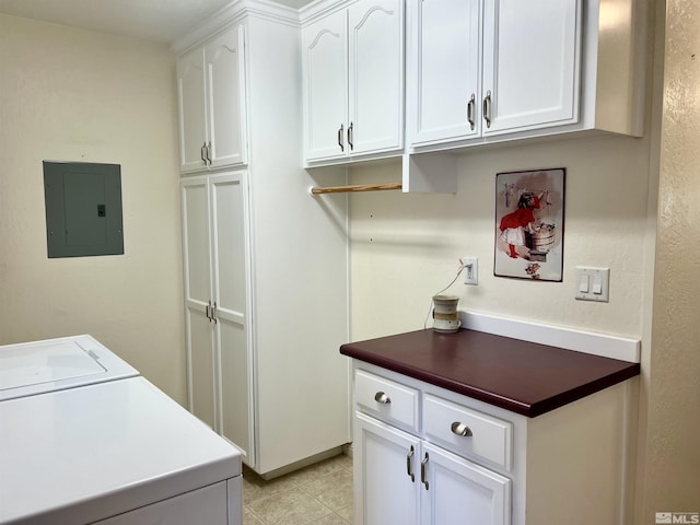 2 N Whitacre St, Yerington, NV 89447 - laundry area featuring electric panel, cabinet space, washer / dryer, and light tile patterned flooring