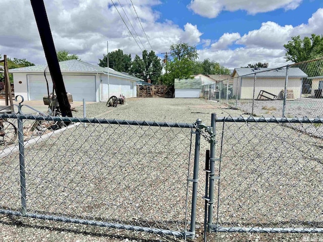 2 N Whitacre St, Yerington, NV 89447 - view of yard with fence and a garage