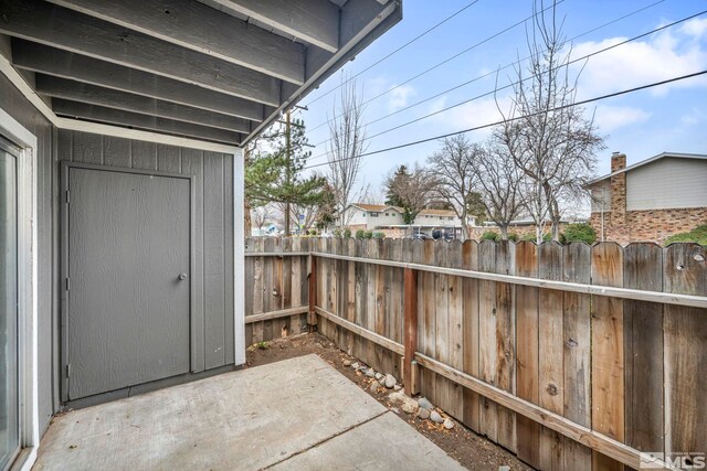 4608 Neil Rd Unit 241, Reno, NV 89502 - view of patio / terrace featuring fence, a shed, and an outdoor structure