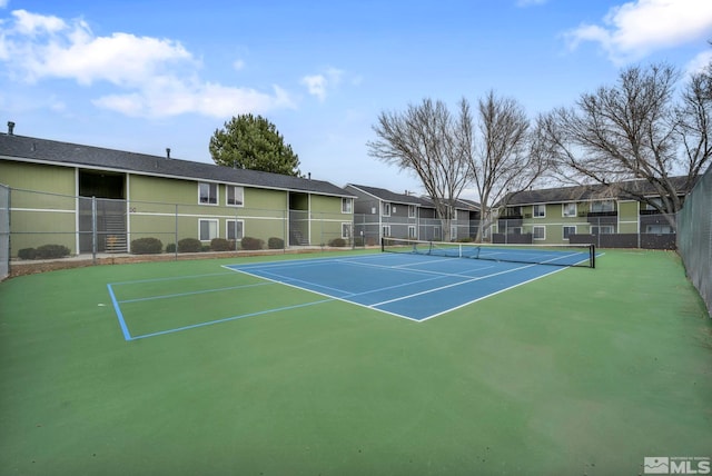 4608 Neil Rd Unit 241, Reno, NV 89502 - view of tennis court with fence, community basketball court, and a residential view