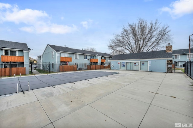 4608 Neil Rd Unit 241, Reno, NV 89502 - community pool featuring a residential view, a patio area, and fence
