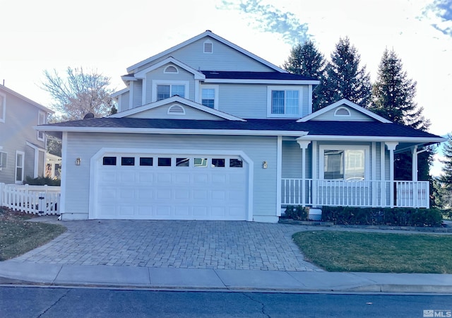 3678 Brighton Way, Reno, NV 89509 - traditional-style home with covered porch, decorative driveway, and an attached garage