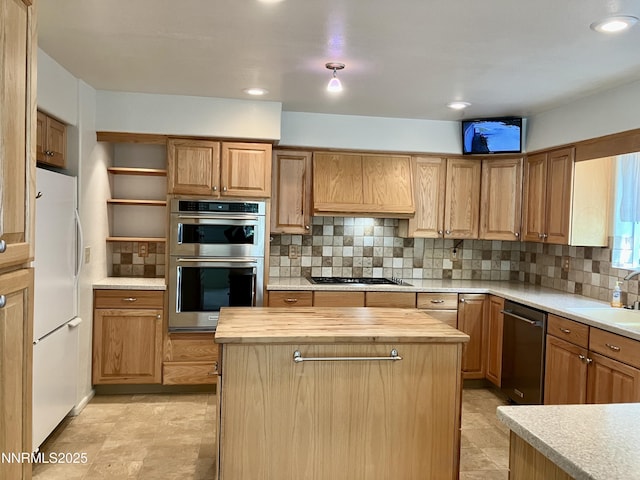 3678 Brighton Way, Reno, NV 89509 - kitchen with stainless steel appliances, wood counters, tasteful backsplash, a center island, and open shelves